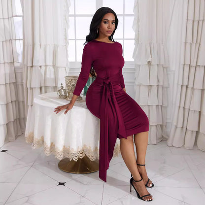 Elegancka sukienka midi z węzłem z przodu i rozcięciem dla kobiet